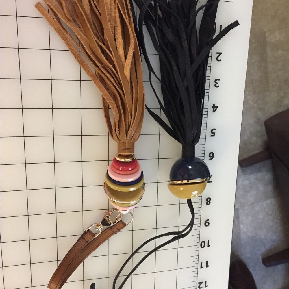 2 leather Fossil Tassels